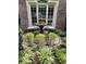 Outdoor patio with fountain and greenery, perfect for relaxing and enjoying nature at 1239 Bonshaw Trl, Marietta, GA 30064