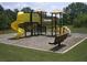 Community playground offers a fun and safe recreation area with slides, climbing structures, and a shaded bench at 1239 Bonshaw Trl, Marietta, GA 30064