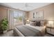 Comfortable bedroom with large window for natural light, stylish furnishings, and soothing decor at 179 Country Club Dr, Hiram, GA 30141