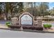 Creekside Golf and Country Club entrance sign with stone pillars and manicured landscaping at 179 Country Club Dr, Hiram, GA 30141