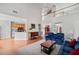 Open-concept living room with stainless steel appliances, and a view of the upstairs at 179 Country Club Dr, Hiram, GA 30141