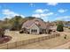 Charming home featuring a backyard pergola, well-manicured lawn, and an inviting outdoor space at 179 Country Club Dr, Hiram, GA 30141