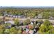 This aerial view shows the property's location and neighborhood with its mature trees and proximity to the city at 2018 Presley Ne Way, Atlanta, GA 30317