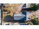 Aerial view of the house showing the backyard, roof, and surrounding trees at 2018 Presley Ne Way, Atlanta, GA 30317