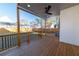 An inviting back deck offers a relaxing outdoor space with a ceiling fan and backyard views at 2018 Presley Ne Way, Atlanta, GA 30317