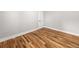 Empty bedroom with hardwood floors and white trim at 2018 Presley Ne Way, Atlanta, GA 30317