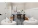 A stylish home office featuring modern decor, wood floors, and ample natural light for a productive workspace at 2018 Presley Ne Way, Atlanta, GA 30317