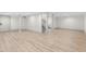Basement featuring modern flooring, recessed lighting, and supporting columns at 3216 Woodview Se Dr, Smyrna, GA 30082