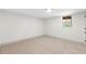 Cozy bedroom with neutral carpet, and a large window providing ample natural light at 3216 Woodview Se Dr, Smyrna, GA 30082