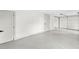 Spacious garage with sealed flooring and white walls at 3216 Woodview Se Dr, Smyrna, GA 30082