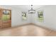 Bright living room with hardwood floors, plenty of natural light, and freshly painted walls at 3216 Woodview Se Dr, Smyrna, GA 30082