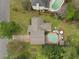Aerial view of property featuring a private backyard with a swimming pool, perfect for entertaining at 1068 Gwens Sw Trl, Lilburn, GA 30047