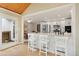 Stylish kitchen with stainless appliances, granite counters, a breakfast bar, and backyard access at 1068 Gwens Sw Trl, Lilburn, GA 30047