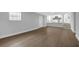 Large basement featuring a utility door, window, and stairway to the kitchen at 1449 Hoy Taylor Dr, Norcross, GA 30093