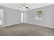 Bedroom featuring neutral paint, a ceiling fan, and a window with blinds at 1449 Hoy Taylor Dr, Norcross, GA 30093