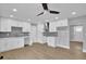 Modern kitchen featuring white cabinets, stainless steel appliances, and hardwood floors at 1449 Hoy Taylor Dr, Norcross, GA 30093