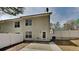 This home boasts a quaint backyard with a private patio, perfect for outdoor entertaining and relaxation at 4480 Maple Valley Dr, Cumming, GA 30040