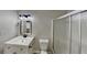 Clean bathroom featuring a modern vanity, a glass-enclosed shower, updated fixtures and neutral paint at 4480 Maple Valley Dr, Cumming, GA 30040