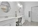 Bright bathroom boasts double vanity, modern fixtures, and ample counter space at 5085 Mundy Dr, Cumming, GA 30028