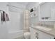 Clean bathroom with a shower-tub combo, vanity, and neutral color palette at 5085 Mundy Dr, Cumming, GA 30028