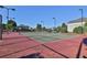 Well-maintained community tennis courts with new netting and lighting at 5085 Mundy Dr, Cumming, GA 30028