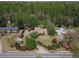Aerial view of a single-story home and its landscaped surroundings at 660 Hembree Rd, Roswell, GA 30076