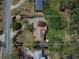 Aerial view of a single-story home showing approximate property lines, landscaping, and surrounding neighborhood at 660 Hembree Rd, Roswell, GA 30076