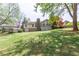 Beautiful backyard of home featuring grass, trees, and plenty of room at 660 Hembree Rd, Roswell, GA 30076