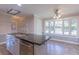 Kitchen with an island, stainless steel appliances and a breakfast nook at 660 Hembree Rd, Roswell, GA 30076
