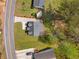 Aerial view of the property showing the well-maintained landscaping and neighborhood at 1071 N Price Rd, Sugar Hill, GA 30518