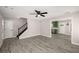 Comfortable living space with an open floor plan and modern ceiling fan at 1071 N Price Rd, Sugar Hill, GA 30518