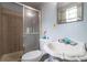 Small bathroom featuring a shower, toilet and sink at 1486 Harbins Rd, Norcross, GA 30093