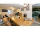 Spacious living area, transitioning into the dining and kitchen spaces, creating an open and inviting atmosphere at 1486 Harbins Rd, Norcross, GA 30093