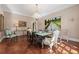 Traditional dining room with patterned floors, chandelier, and neutral walls at 8 W Andrews Nw Dr, Atlanta, GA 30305