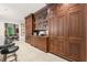Formal dining area featuring custom wood cabinetry, offering both beauty and functionality for storage at 8 W Andrews Nw Dr, Atlanta, GA 30305