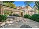 Spacious driveway featuring covered parking, mature trees, and manicured landscaping at 8 W Andrews Nw Dr, Atlanta, GA 30305
