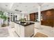 Spacious kitchen boasts an island, modern appliances, and large windows providing natural light and great views at 8 W Andrews Nw Dr, Atlanta, GA 30305