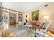 Inviting living room with custom built-ins, hardwood floors, and large windows at 8 W Andrews Nw Dr, Atlanta, GA 30305