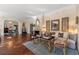 Comfortable living room with elegant furniture, area rug, hardwood floors, and decorative art at 8 W Andrews Nw Dr, Atlanta, GA 30305