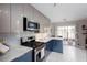 Well-equipped kitchen with stainless steel appliances, modern cabinetry, and a convenient layout for cooking at 1037 Dunedin Trl, Woodstock, GA 30188