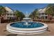 Beautiful fountain with blue water surrounded by a brick walkway, and buildings with white balconies at 2189 Gordon Se Cir, Smyrna, GA 30080