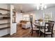 Cozy living room featuring hardwood floors, stylish furniture, and open shelving for decor at 2189 Gordon Se Cir, Smyrna, GA 30080