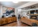 Spacious living room featuring modern fireplace, hardwood floors, and designer furniture at 2189 Gordon Se Cir, Smyrna, GA 30080