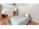 Cozy bedroom with hardwood floors, ceiling fan, and large closets at 1027 Garibaldi Sw St, Atlanta, GA 30310