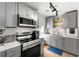 Updated kitchen featuring stainless steel appliances and modern cabinetry at 1027 Garibaldi Sw St, Atlanta, GA 30310