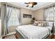 Comfortable bedroom featuring neutral tones, plush pillows, and large windows for natural light at 1257 Lyle Pl, Atlanta, GA 30318