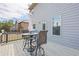 Back deck with outdoor seating and a view of the side of the house at 1861 Poplar Falls Ave, Lithonia, GA 30058