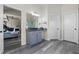 Bathroom with sink, grey cabinet, and a walk-in shower at 1861 Poplar Falls Ave, Lithonia, GA 30058