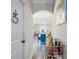 Bright hallway view to dining room area showcases an ideal layout for entertaining guests at 1861 Poplar Falls Ave, Lithonia, GA 30058