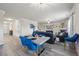Wide angle view of the dining and living areas highlighting the open floor plan at 1861 Poplar Falls Ave, Lithonia, GA 30058